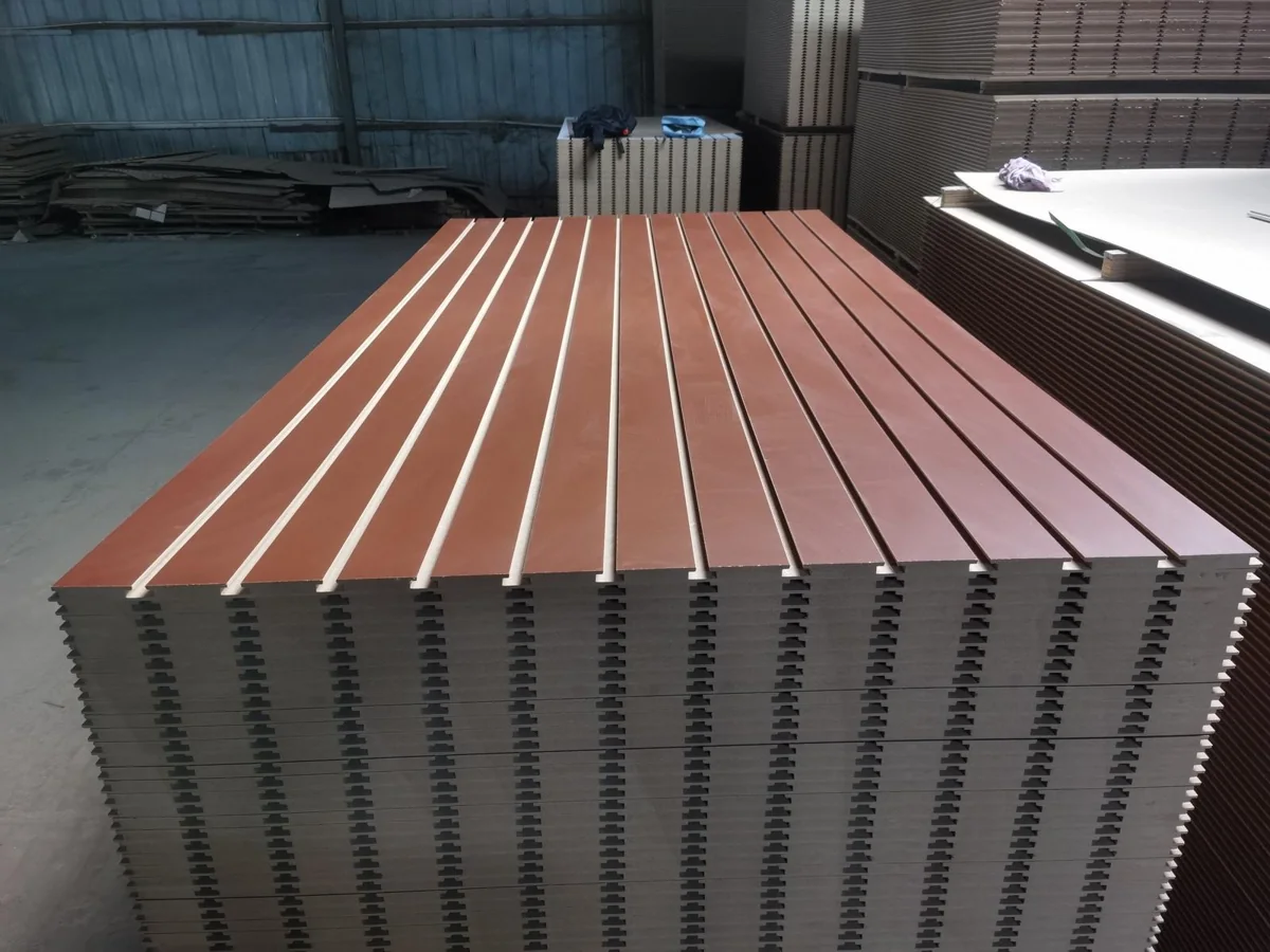 Brown melamine slotted MDF boards from the CUZI order inspected in October 2026